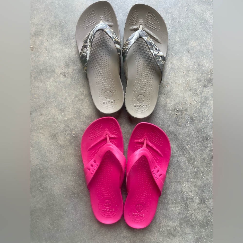Selling Two pairs of croc flip flops.